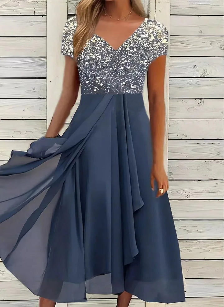 Elegantes Midi-Cocktailkleid mit floralem Oberteil für festliche Anlässe 4