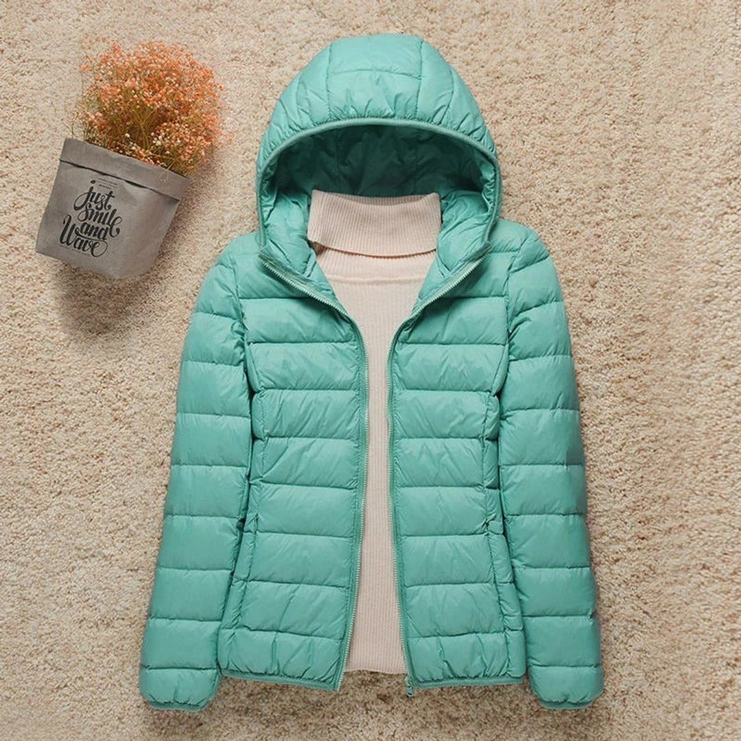 Leichte Damen Steppjacke mit Kapuze – Packbar und Wärmend für Herbst und Winter 9