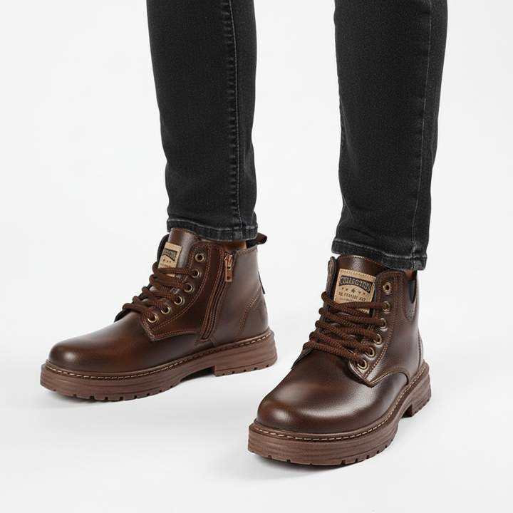 Robuste Stiefel mit Gummisohle und seitlichem Reißverschluss für sicheren Halt 2