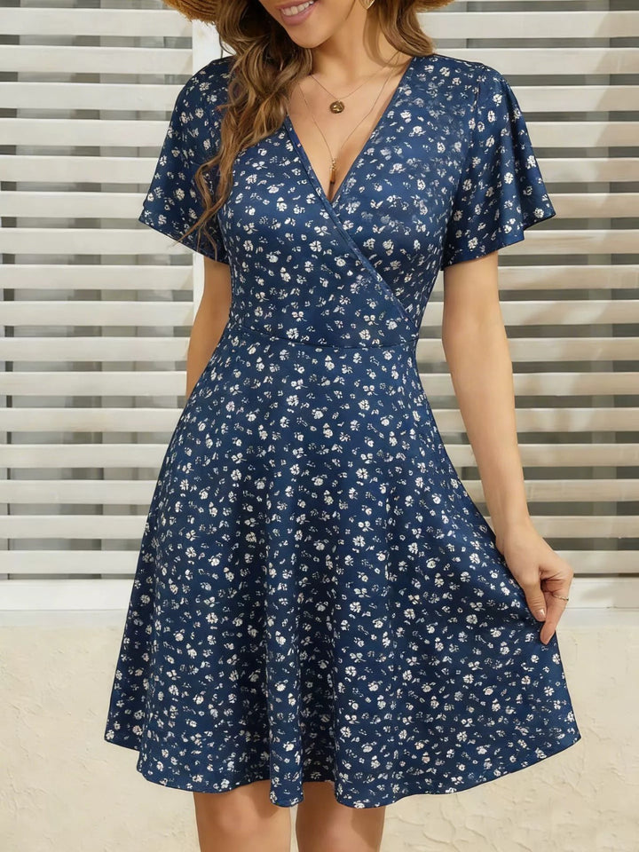 Elegantes Sommerkleid mit Wickelsilhouette und Tupfenmuster für Frauen